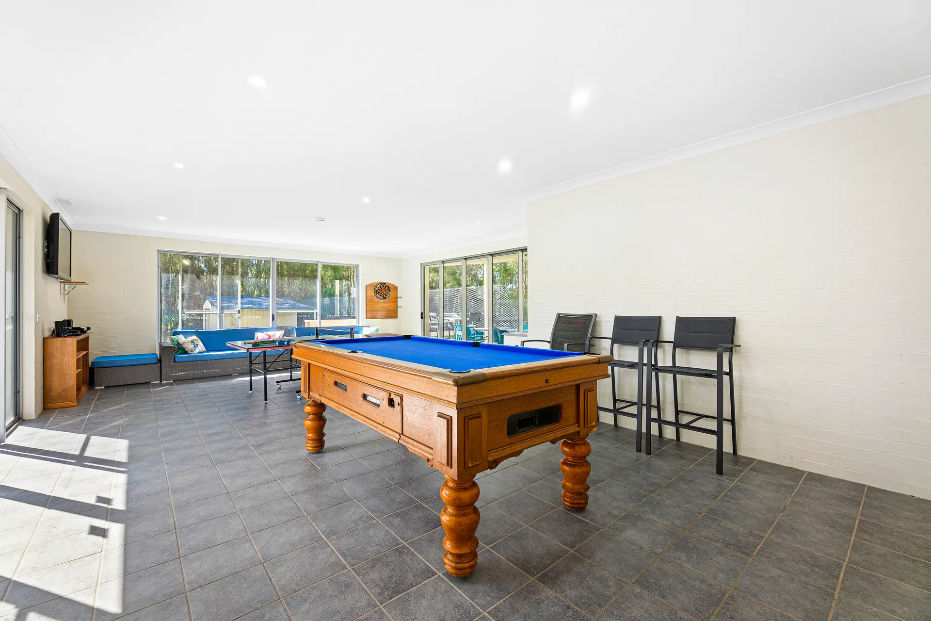 Games room with a pool table