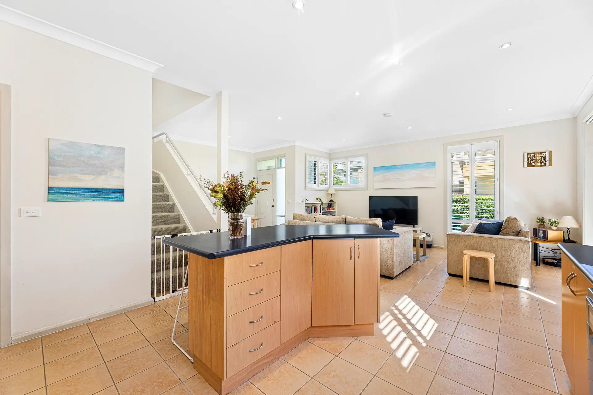 Open-plan living, dining and kitchen area at Bec’s Beach House